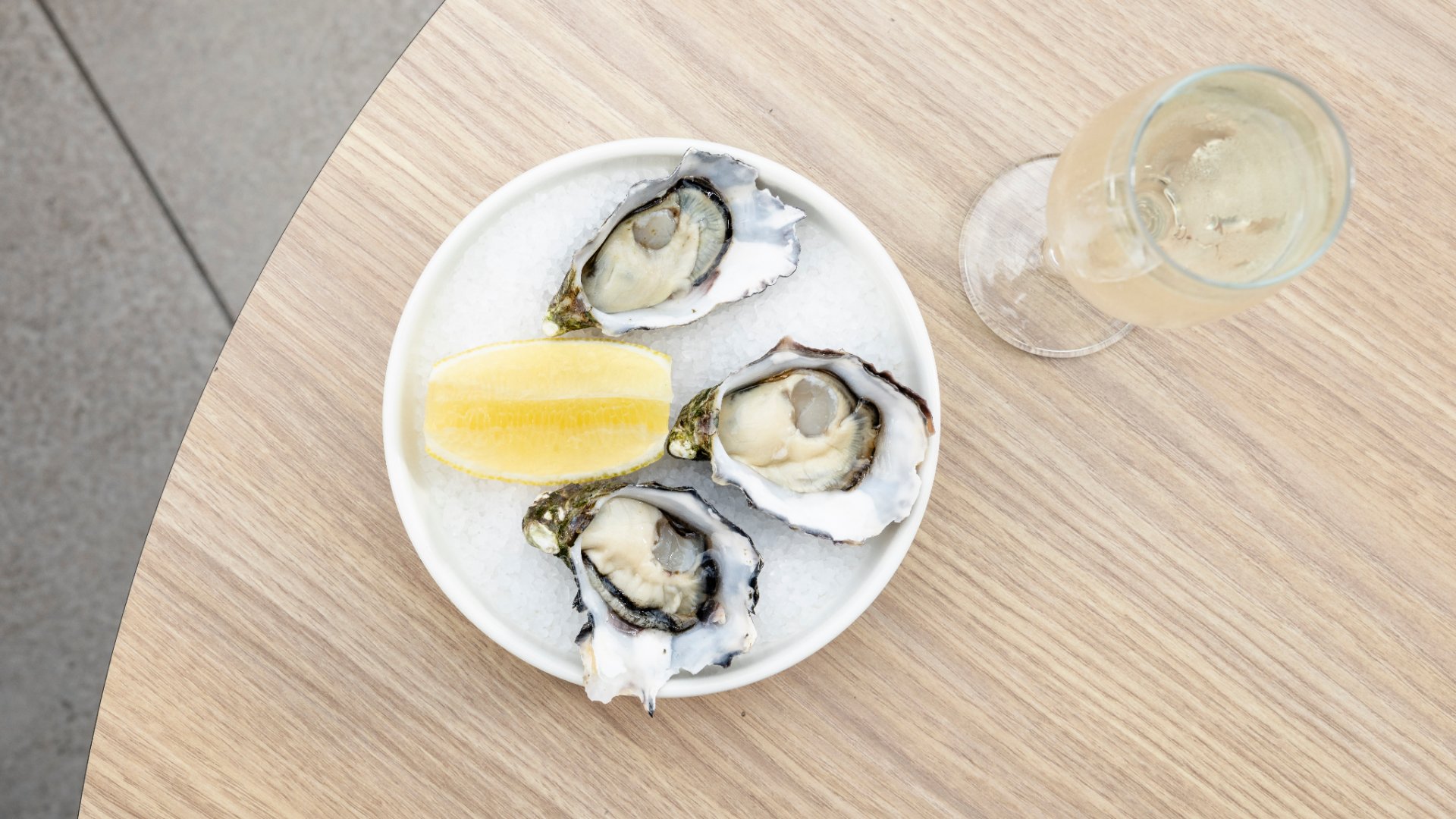3 oysters and glass of champagne at Hibiscus Bar Brisbane 