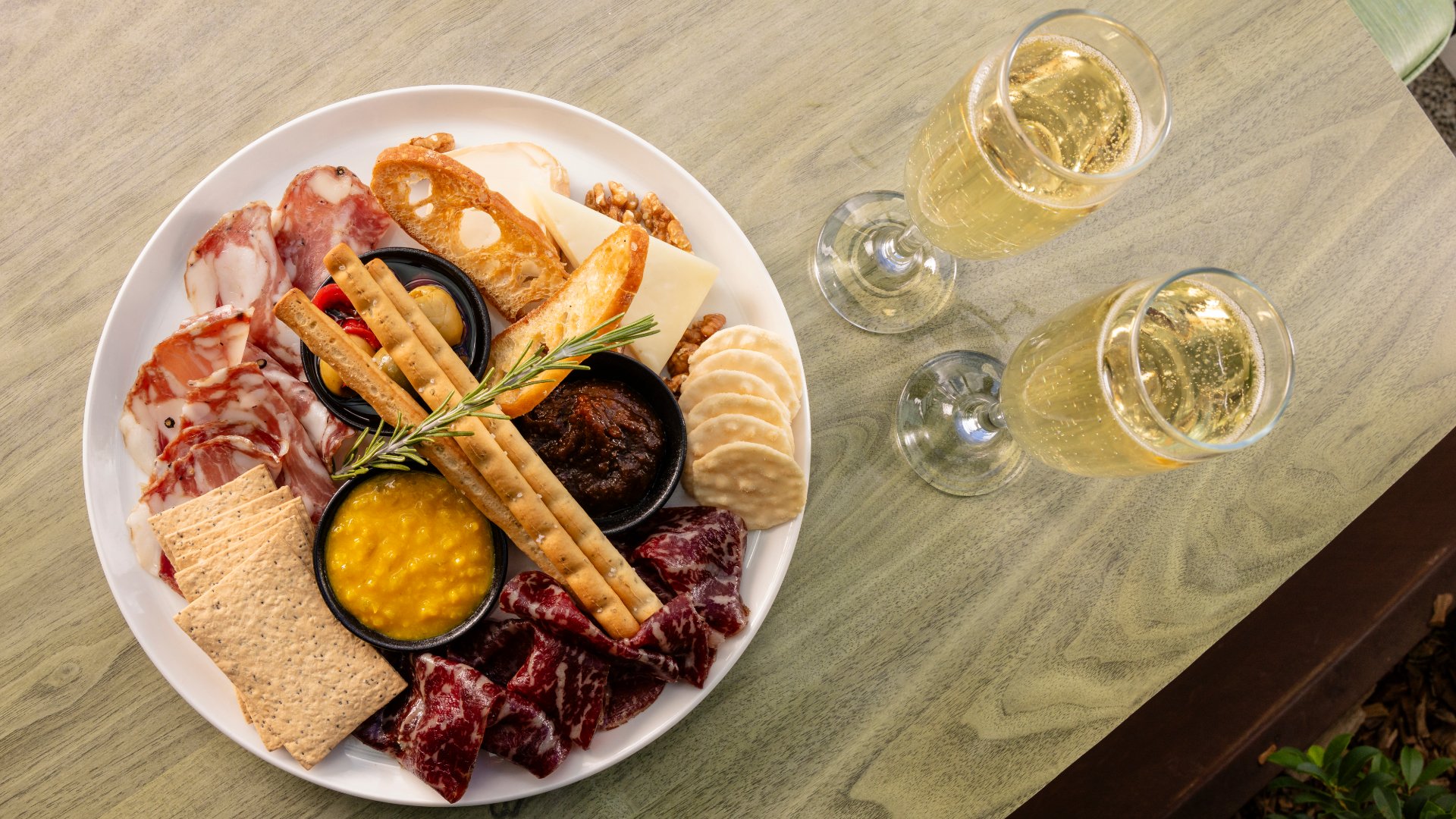 charcuterie board and champagne at Sixteen Antlers. barsafari_dinebne2026_sixteenantlers_38